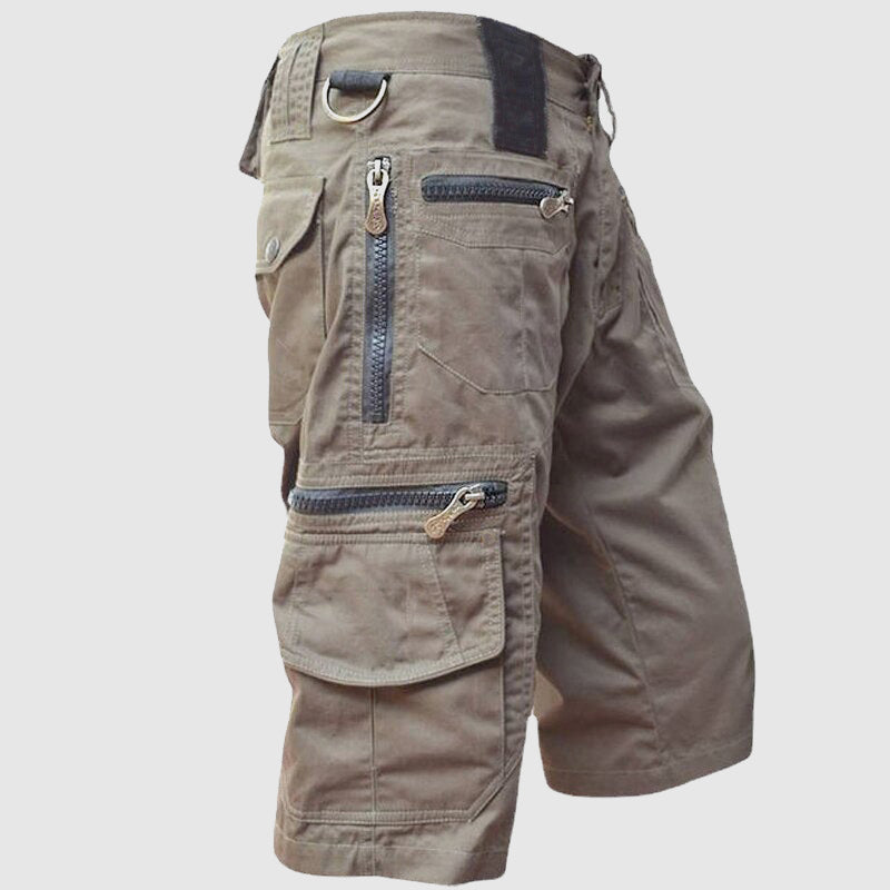 Harvey utility cargo shorts in khaki, side view showing zip pockets and D-ring