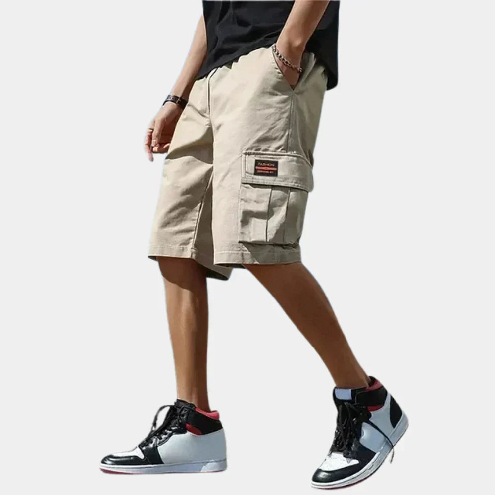 Axel cargo shorts with side flap pocket, front-side view