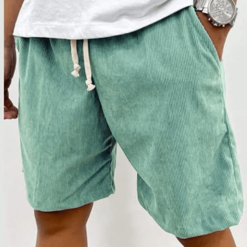 Finn corduroy drawstring shorts in teal, side view