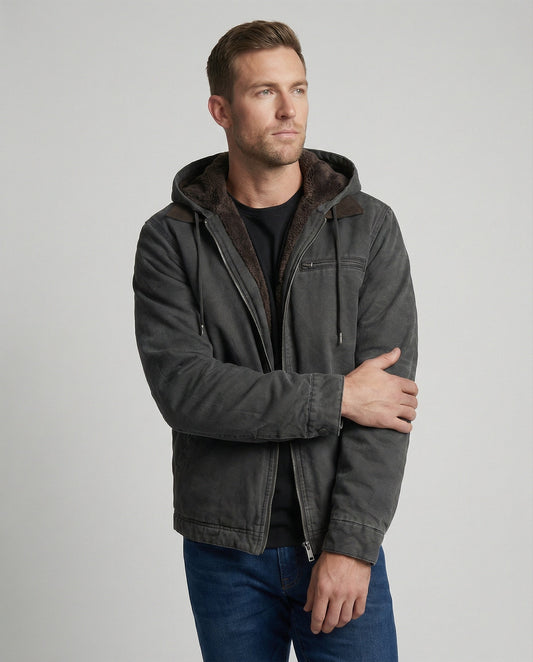 Front view of man wearing Harvey hooded zip-up jacket with arms crossed
