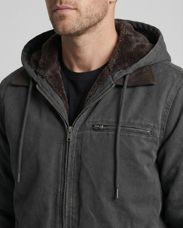 Close-up of Harvey jacket's zip closure, chest pocket, and fleece-lined hood