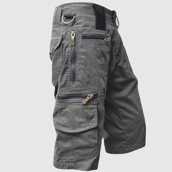 Harvey utility cargo shorts in grey, side view showing zip pockets
