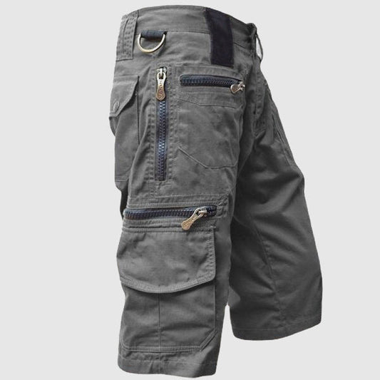 Harvey utility cargo shorts in grey, side view showing zip pockets