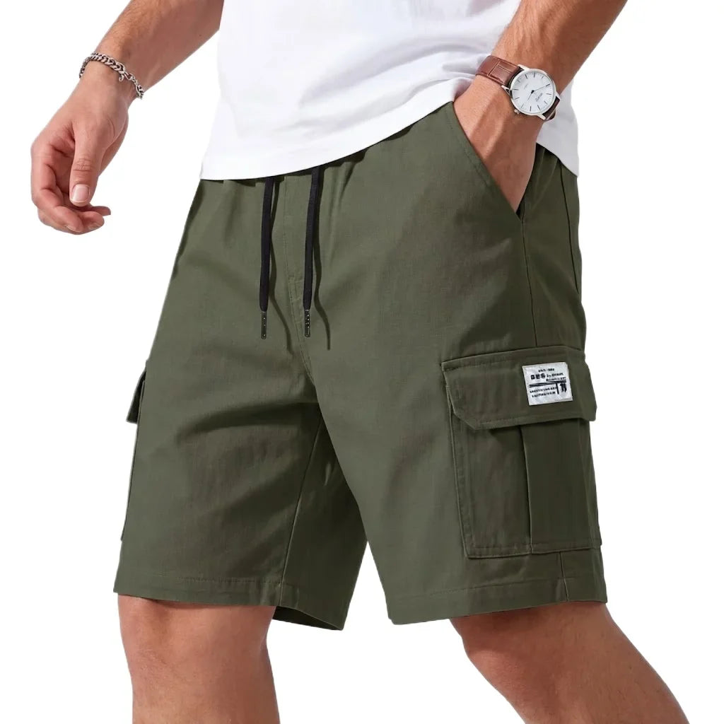 Jack cargo shorts in olive green, front view with hand in pocket