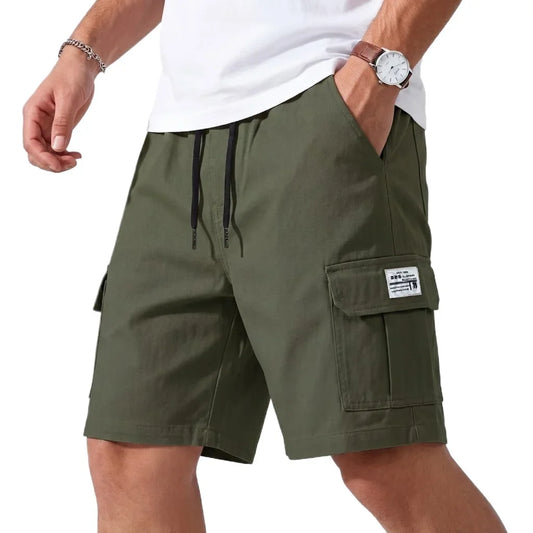 Jack cargo shorts in olive green, front view with hand in pocket