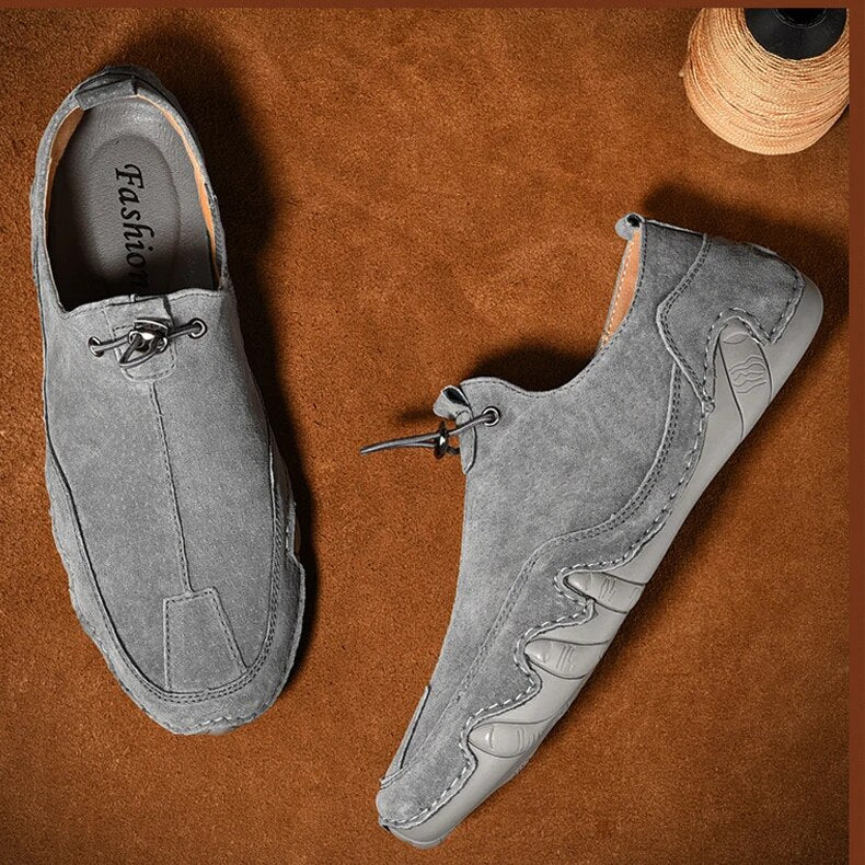 Jasper slip-on loafers in a pair, showing stitched moc-toe design and flexible outsole