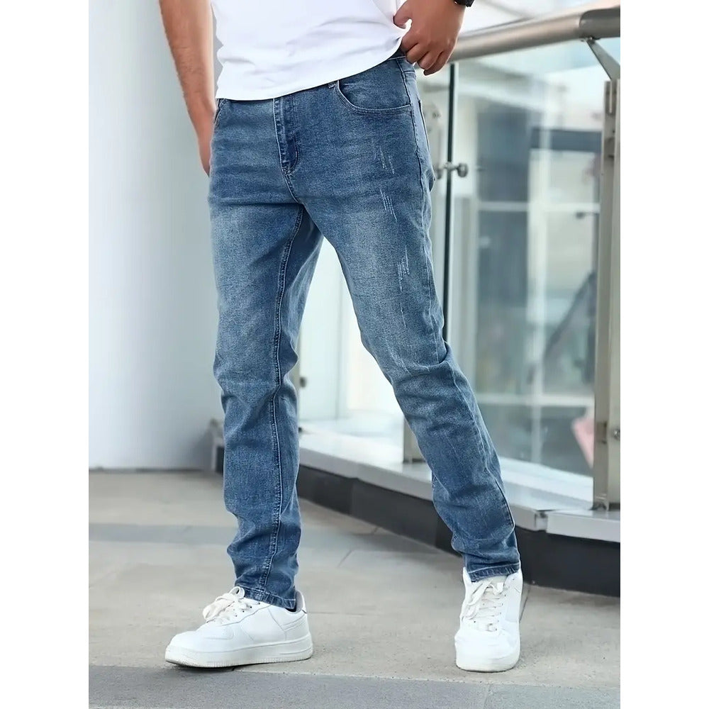Jasper slim tapered jeans, front angle view with hand in pocket