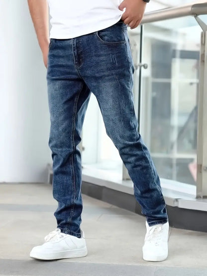 Jasper jeans in navy wash, front standing view
