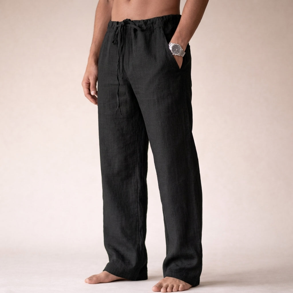 Julian drawstring linen trousers in black, side view