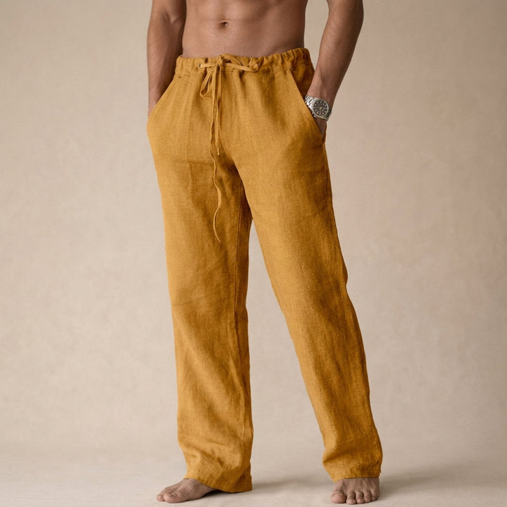 Julian drawstring linen trousers in mustard gold, front view