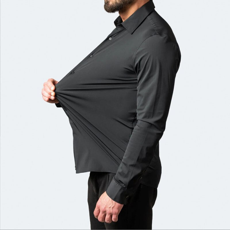 Model stretching the fabric of the black Julian shirt at the side to show stretch