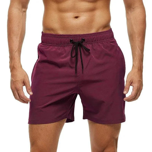 Kai burgundy swim shorts with black drawstring, front view