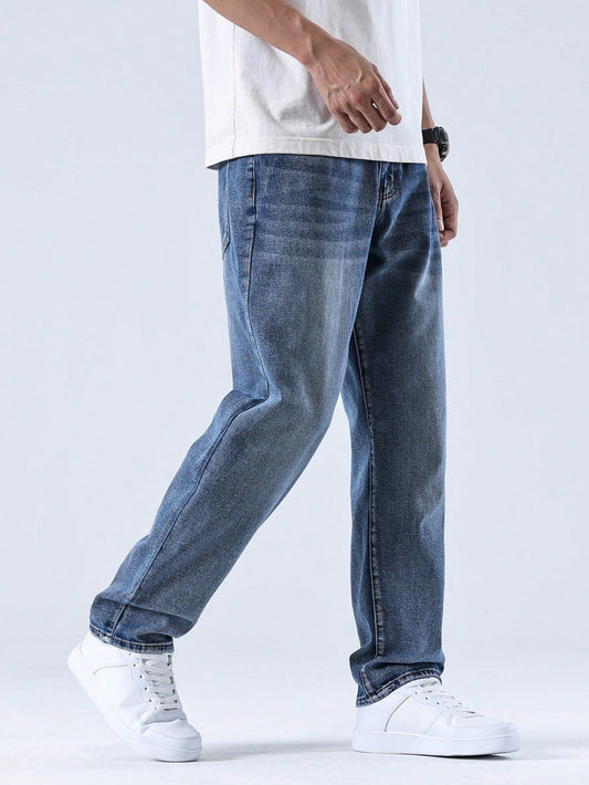 Lars men's washed straight leg jeans in blue, side profile walking