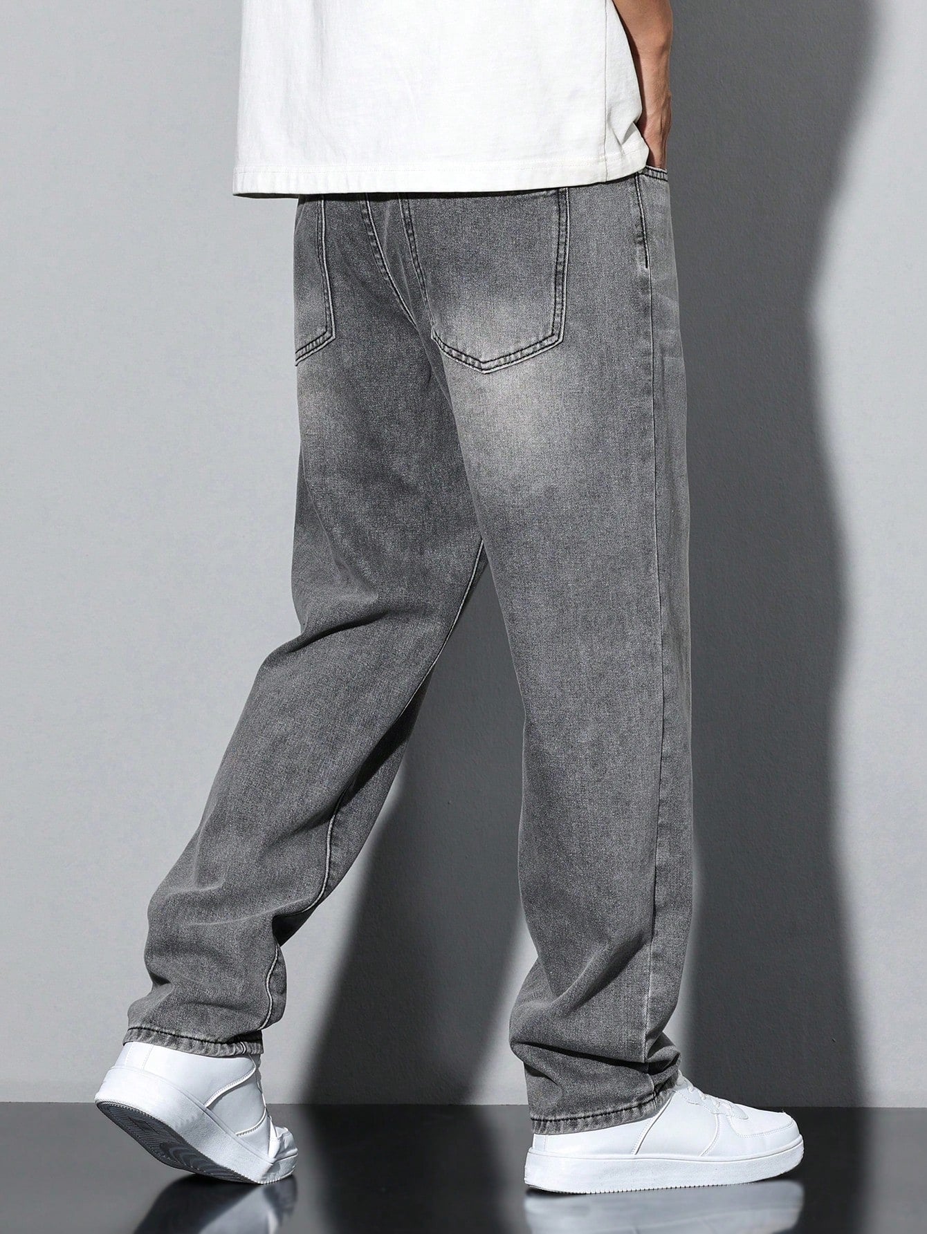 Lars men's washed straight leg jeans in grey, back view walking