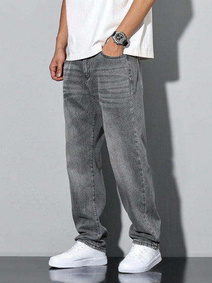 Lars men's washed straight leg jeans in grey, side view with hand in pocket