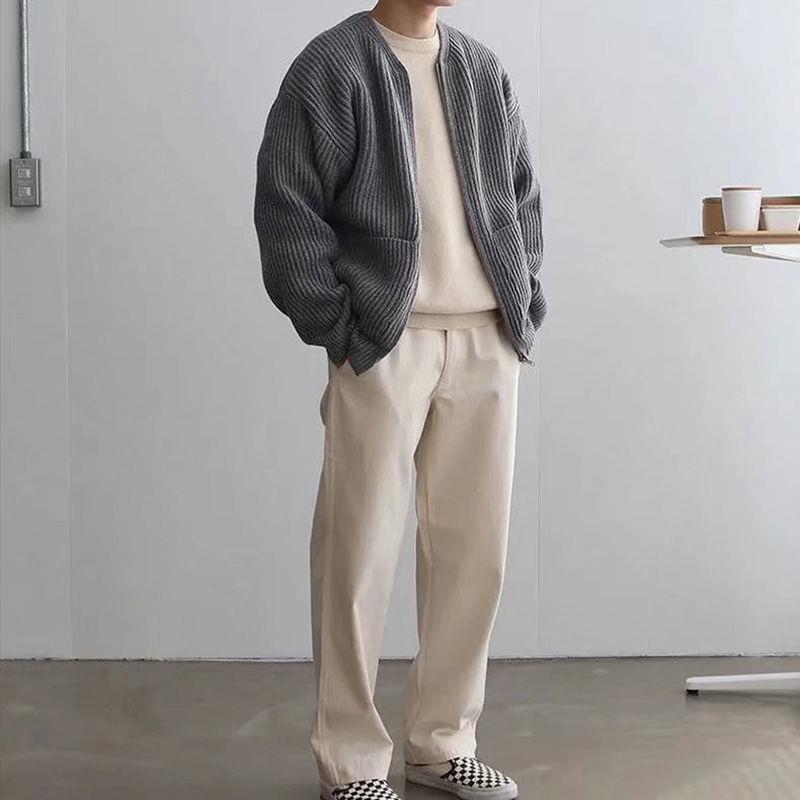 Miles ribbed knit zip-up cardigan in grey, full outfit front view with cream sweater and trousers