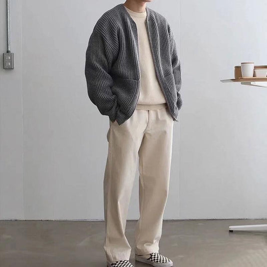Miles ribbed knit zip-up cardigan in grey, full outfit front view with cream sweater and trousers