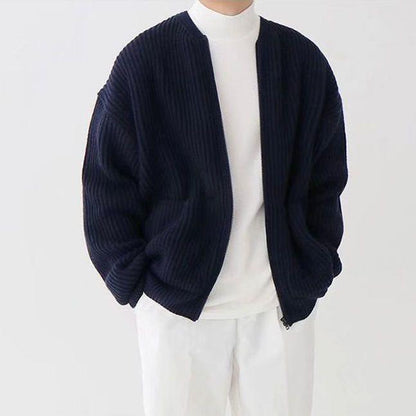 Miles ribbed knit zip-up cardigan in navy, open front view with white turtleneck