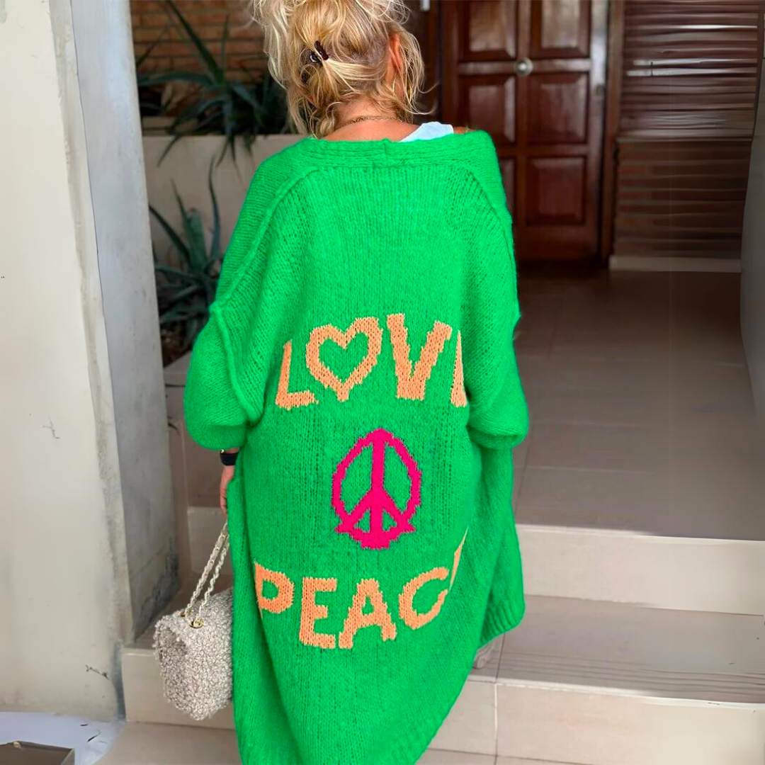 Poppy green slogan print maxi cardigan, back view near steps