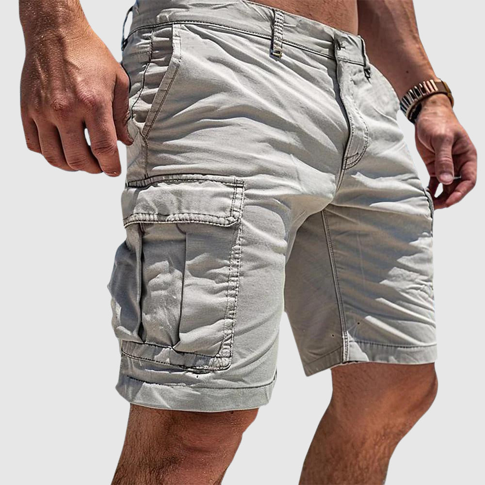 Ruben cargo shorts in light grey, close-up side view showing flap pocket