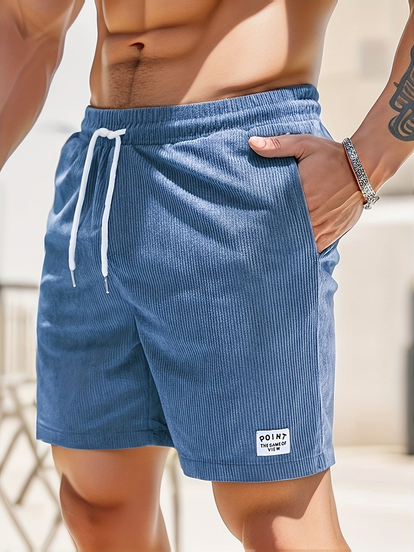 Theo ribbed corduroy shorts in blue, side view with drawstring waistband