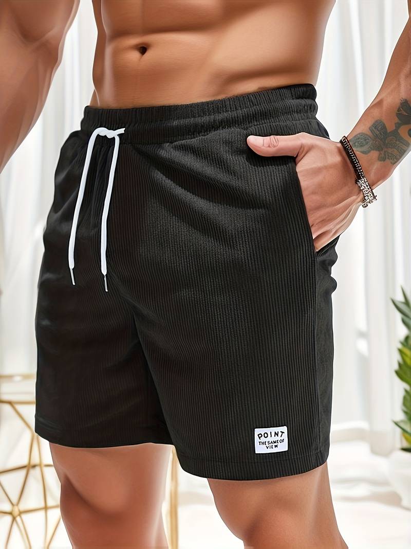 Theo ribbed corduroy shorts in black, close-up front view