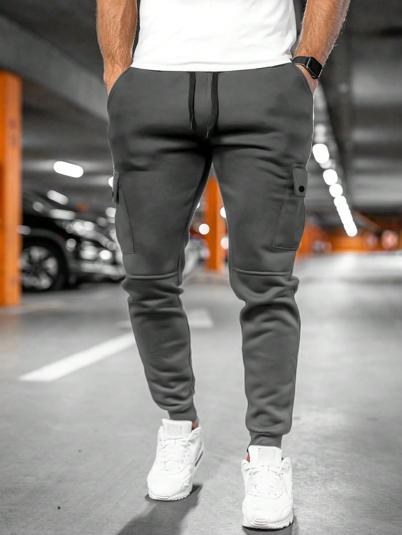 Tom cargo jogger trousers with drawstring waist, back view in dark grey