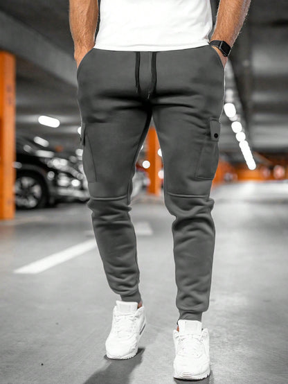 Tom cargo jogger trousers with drawstring waist, back view in dark grey
