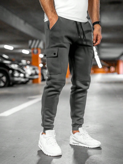 Tom cargo jogger trousers with flap pocket, front view in dark grey