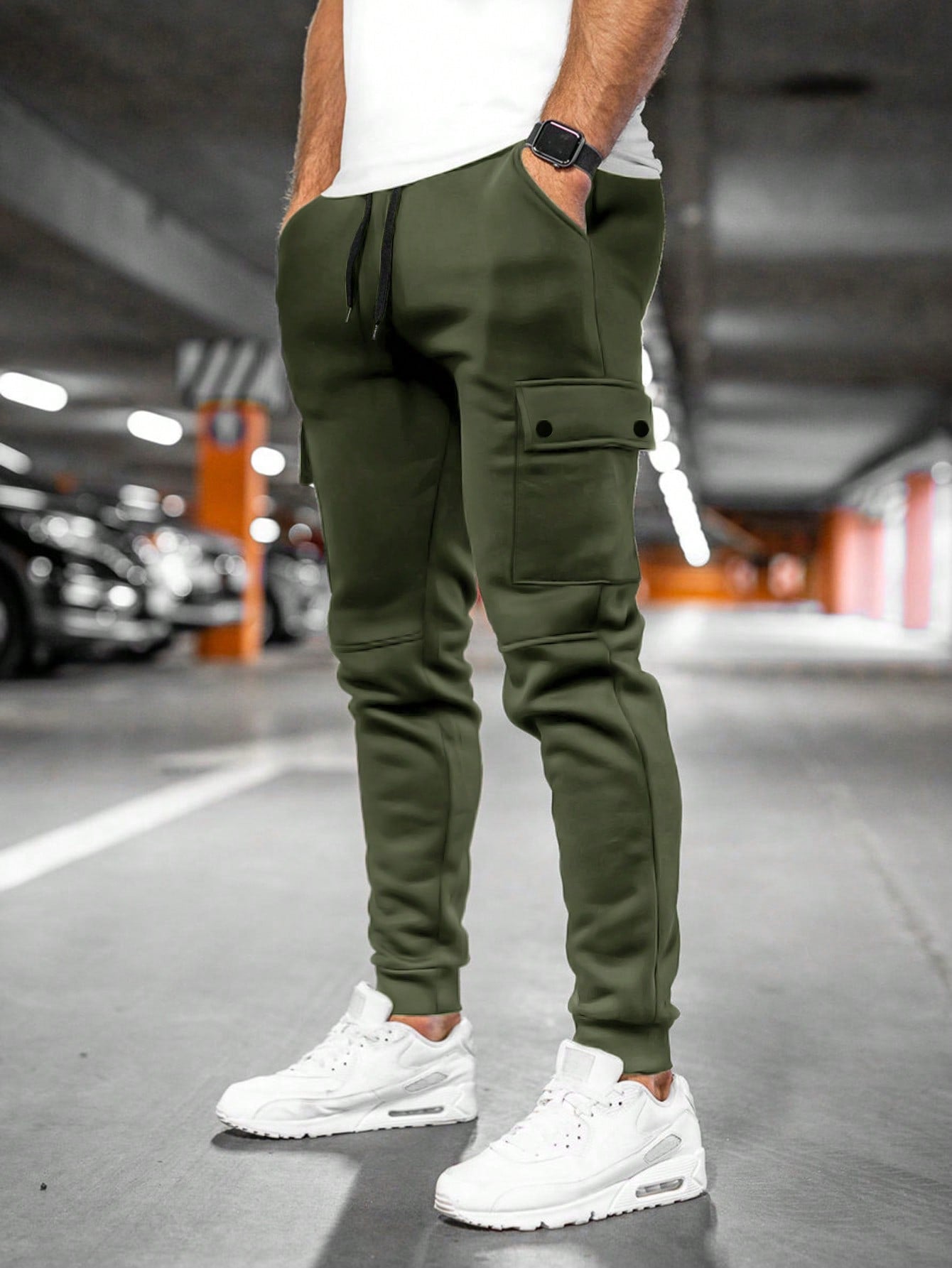 Tom cargo jogger trousers with flap pocket, back view in army green