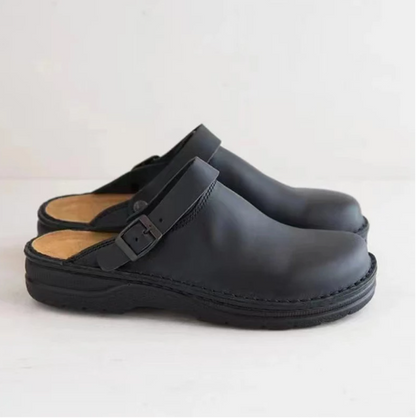 Walter buckle strap orthopedic clog sandals in black, side view pair