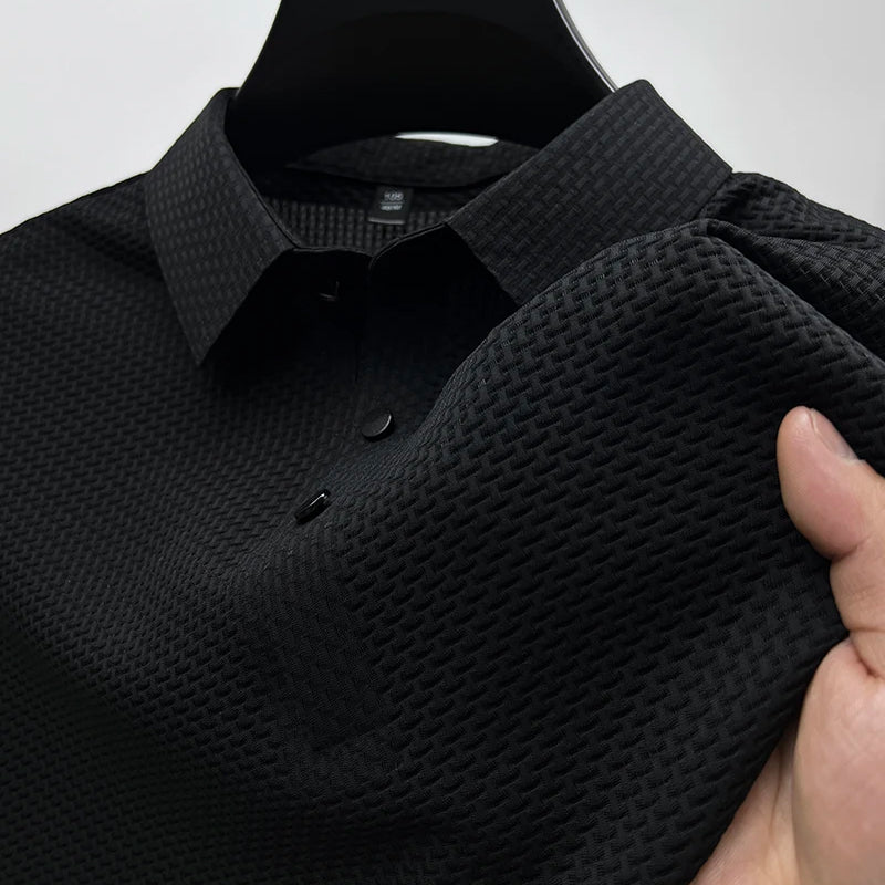 Winston black textured knit polo shirt, close-up of collar and placket detail